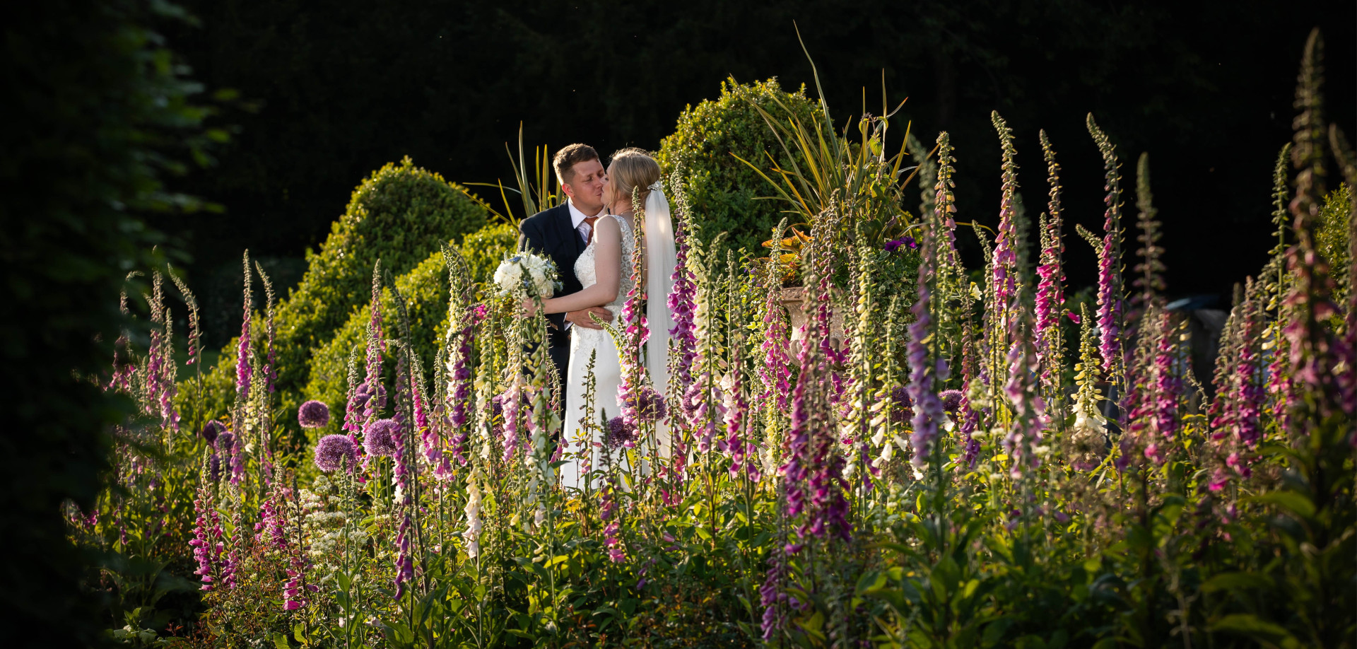 Wedding couple in gardens - Peter Rollings Photography, weddings, family portraits, studio and professional